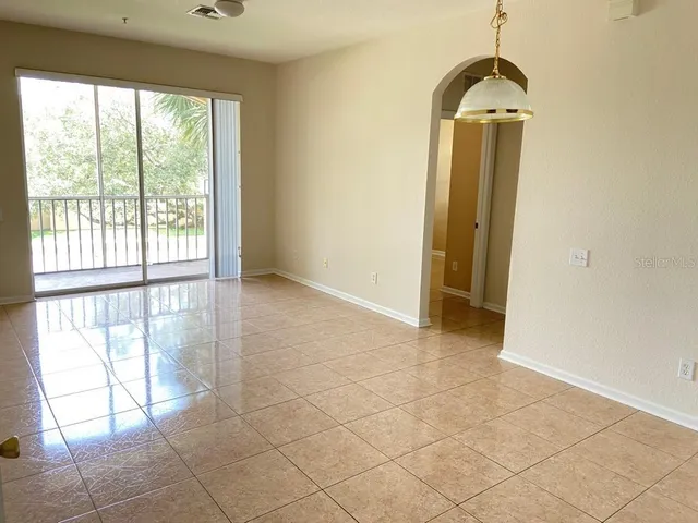 a view of hallway with windows