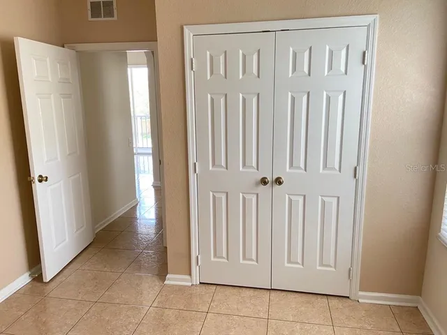 a view of a porch with a door