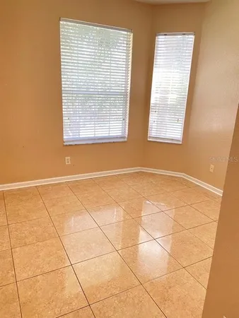 a view of a room with windows