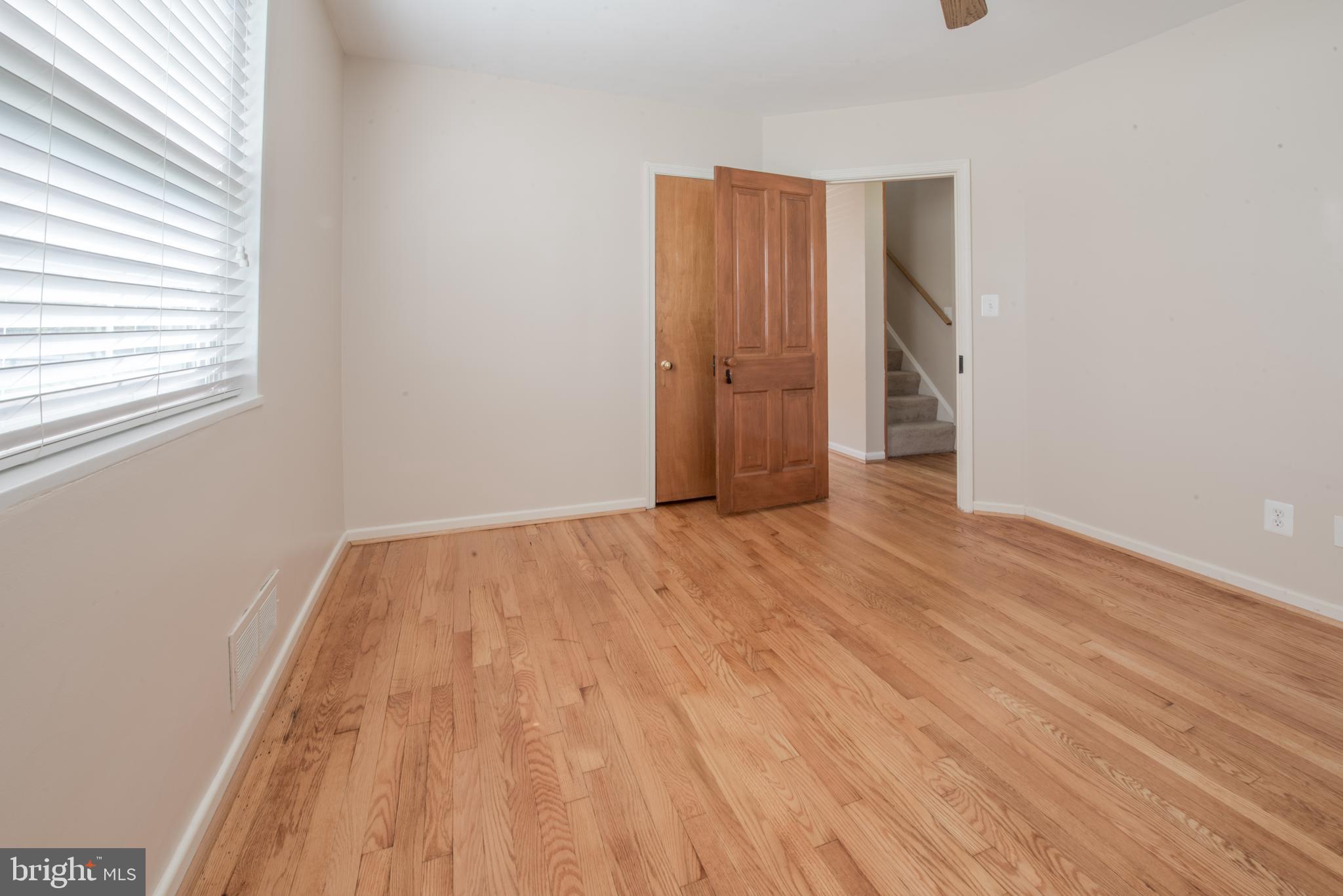 10402 Greentop Road Cockeysville, MD 21030 - Photo 14 of 31 FIRST FLOOR BEDROOM WITH HARDWOOD FLOORS