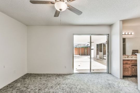 231 South Locust Street Ridgecrest, CA 93555 - Photo 22 of 35 an empty room with fan