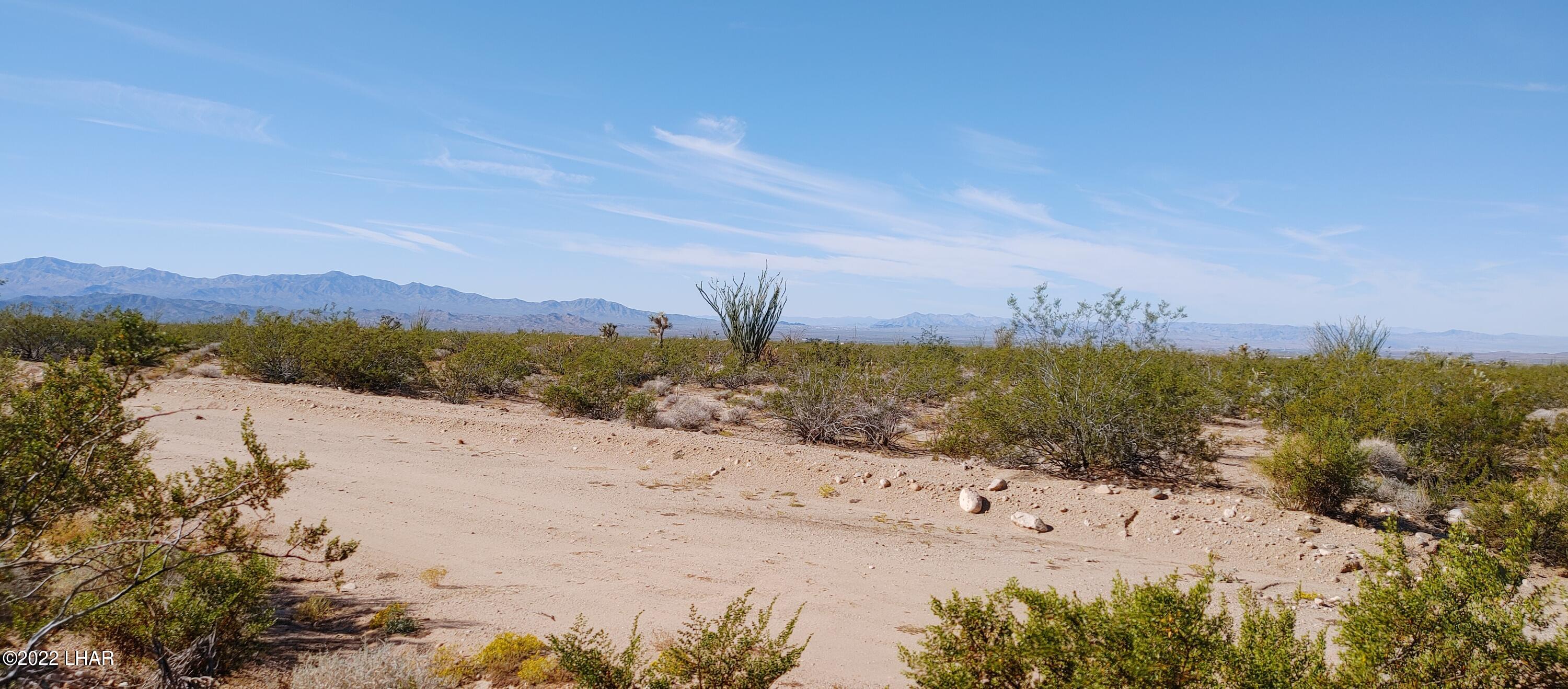 3390 South Doc Holliday Road Yucca, AZ 86438 - Photo 14 of 25 a view of lake view and mountain view