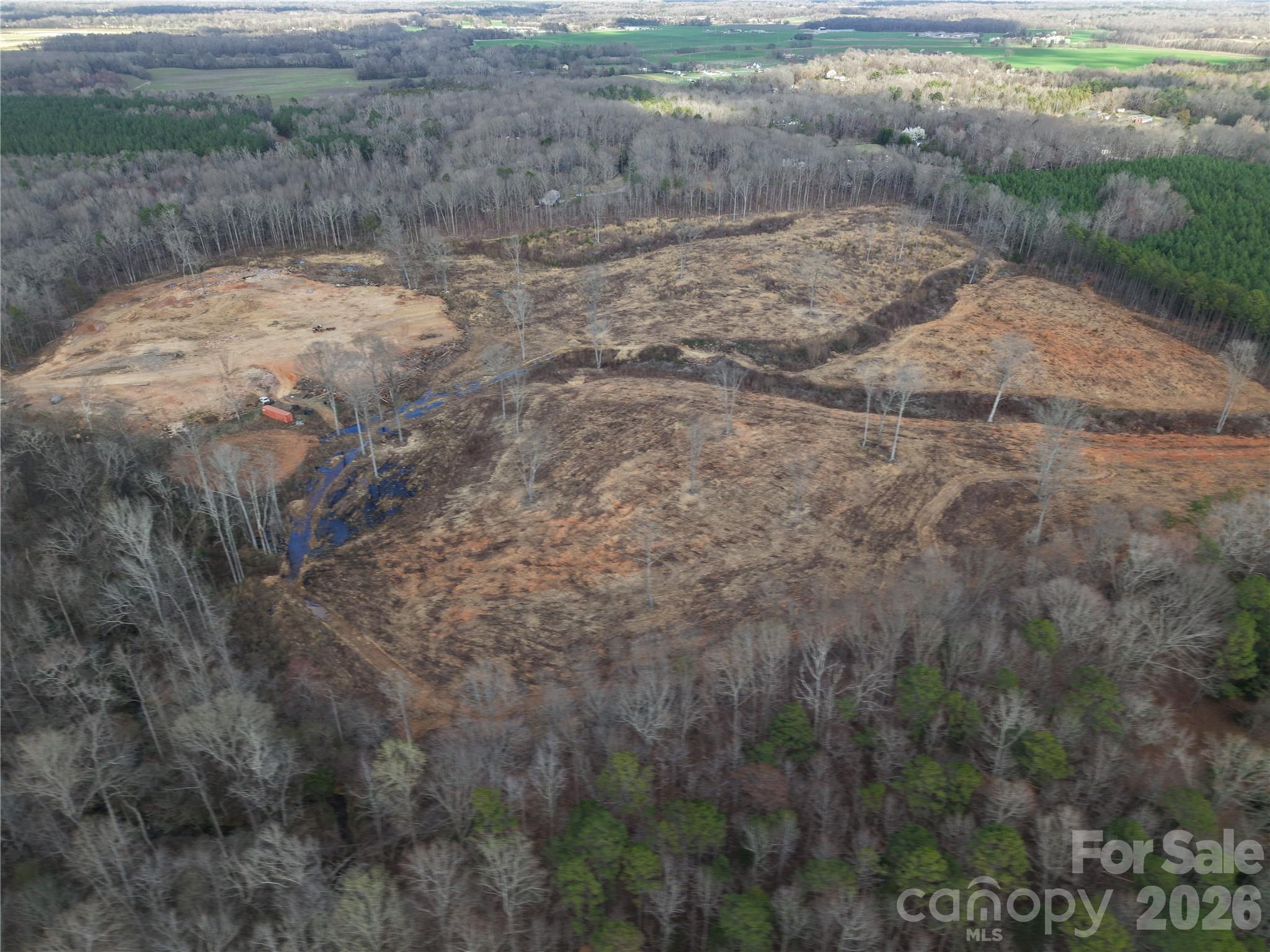 6802 West Duncan Road Indian Trail, NC 28079 - Photo 5 of 10 a view of a dry yard