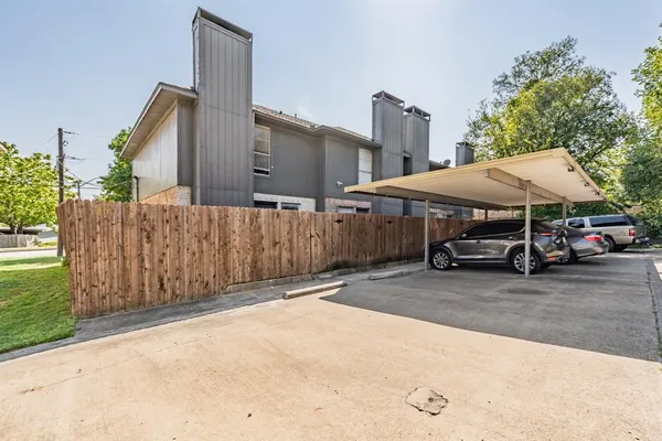 a car parked in front of a house