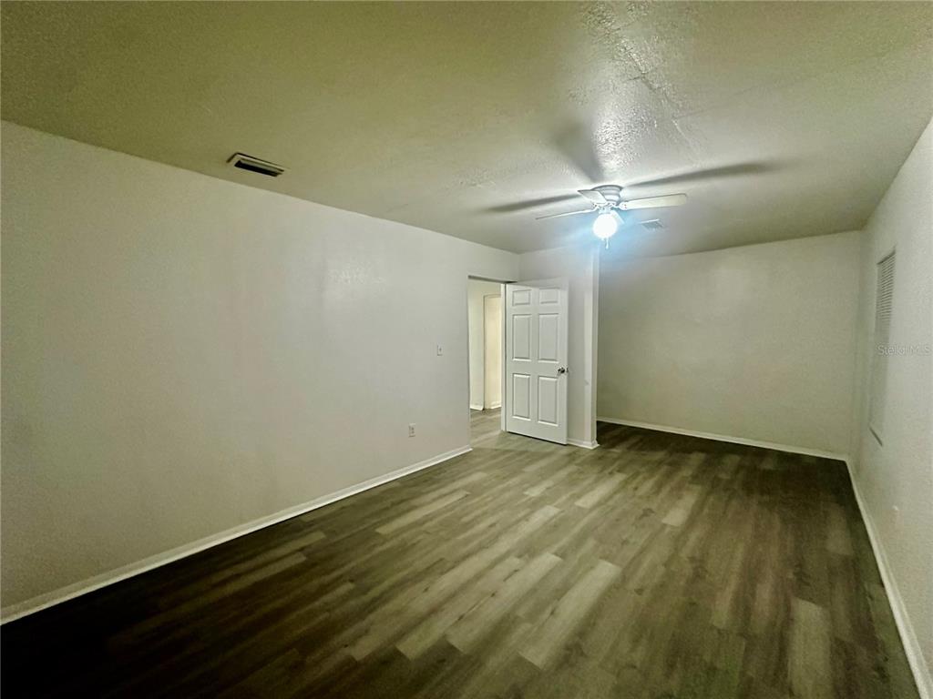 1907 Rio Grande Avenue Orlando, FL 32805 - Photo 17 of 17 wooden floor in an empty room