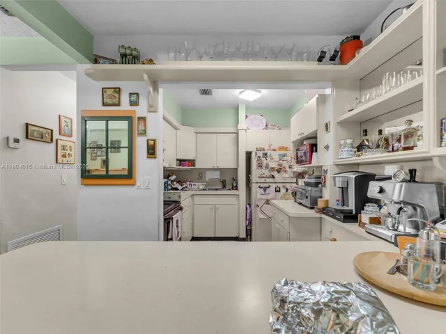 a view of parking area and car parked