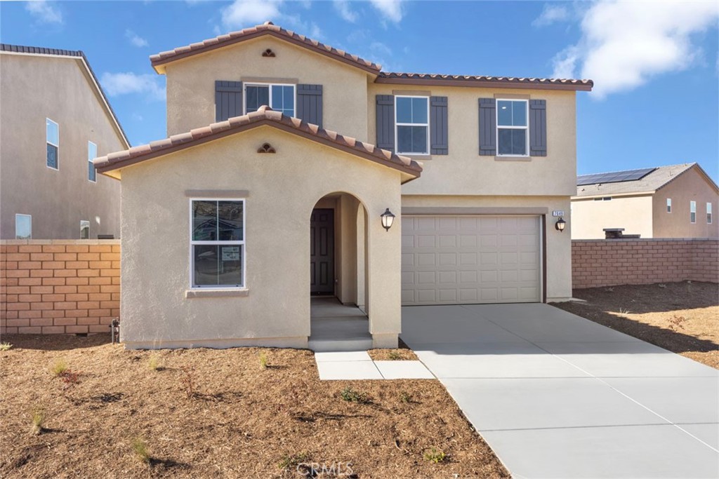 7649 Citrusmoon Court Riverside, CA 92507 - Photo 1 of 1 a front view of a house