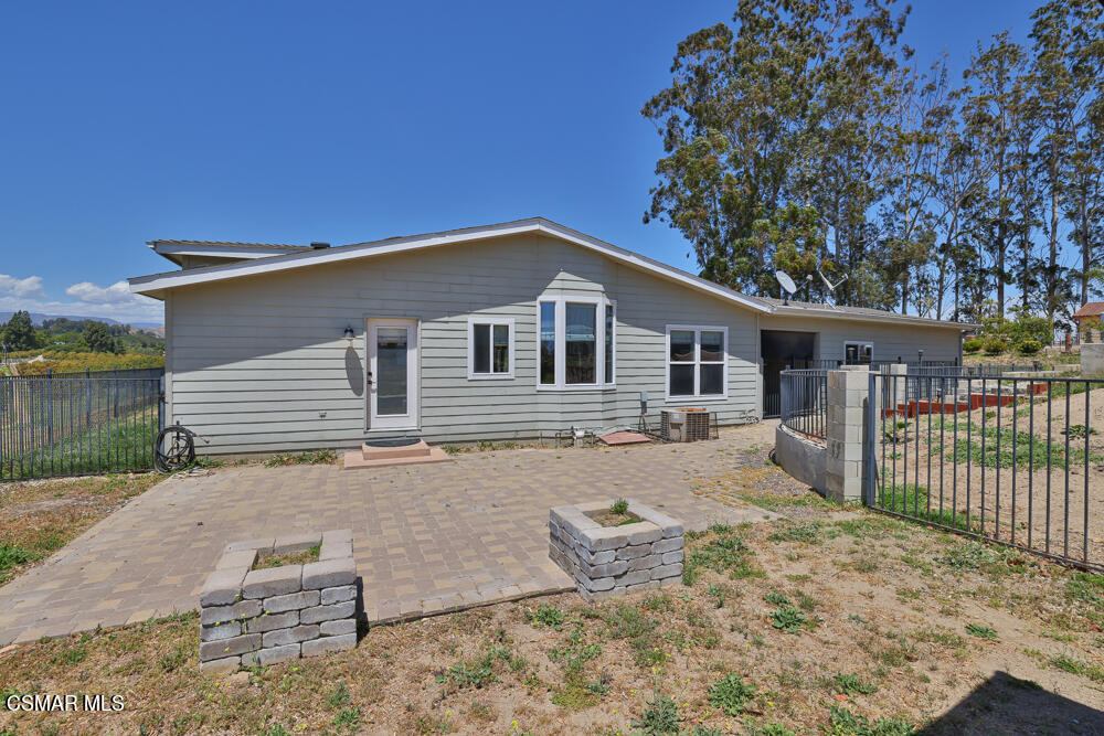 6500 Meadowglade Drive Moorpark, CA 93021 - Photo 16 of 64 a front view of a house with a yard