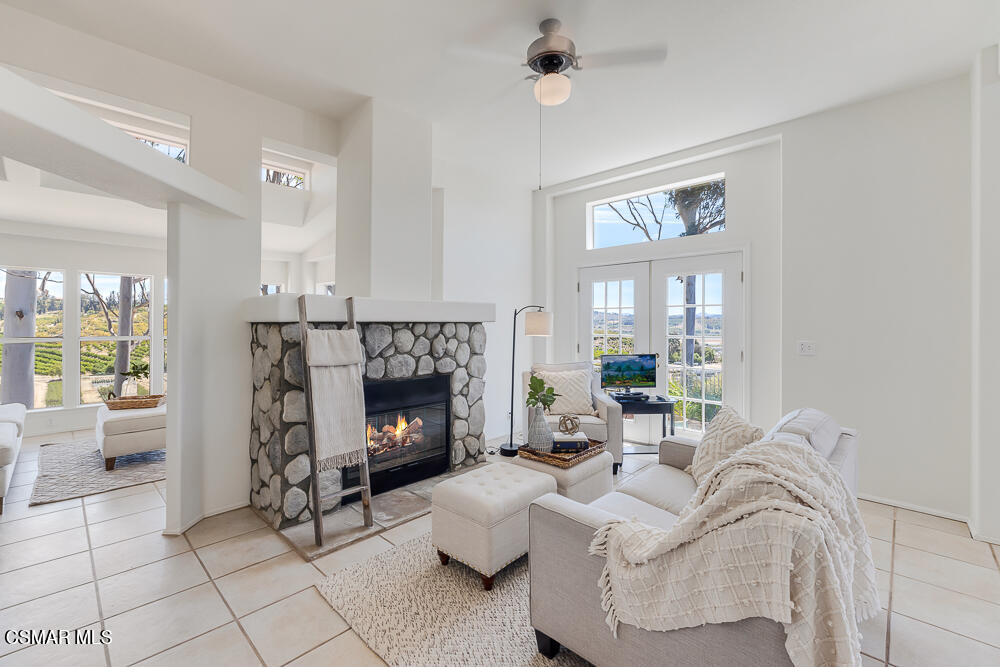6500 Meadowglade Drive Moorpark, CA 93021 - Photo 21 of 64 a living room with furniture and a fireplace