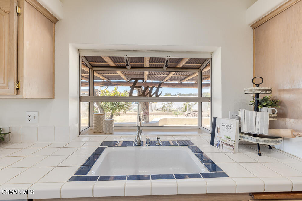 6500 Meadowglade Drive Moorpark, CA 93021 - Photo 26 of 64 a living room with a large window