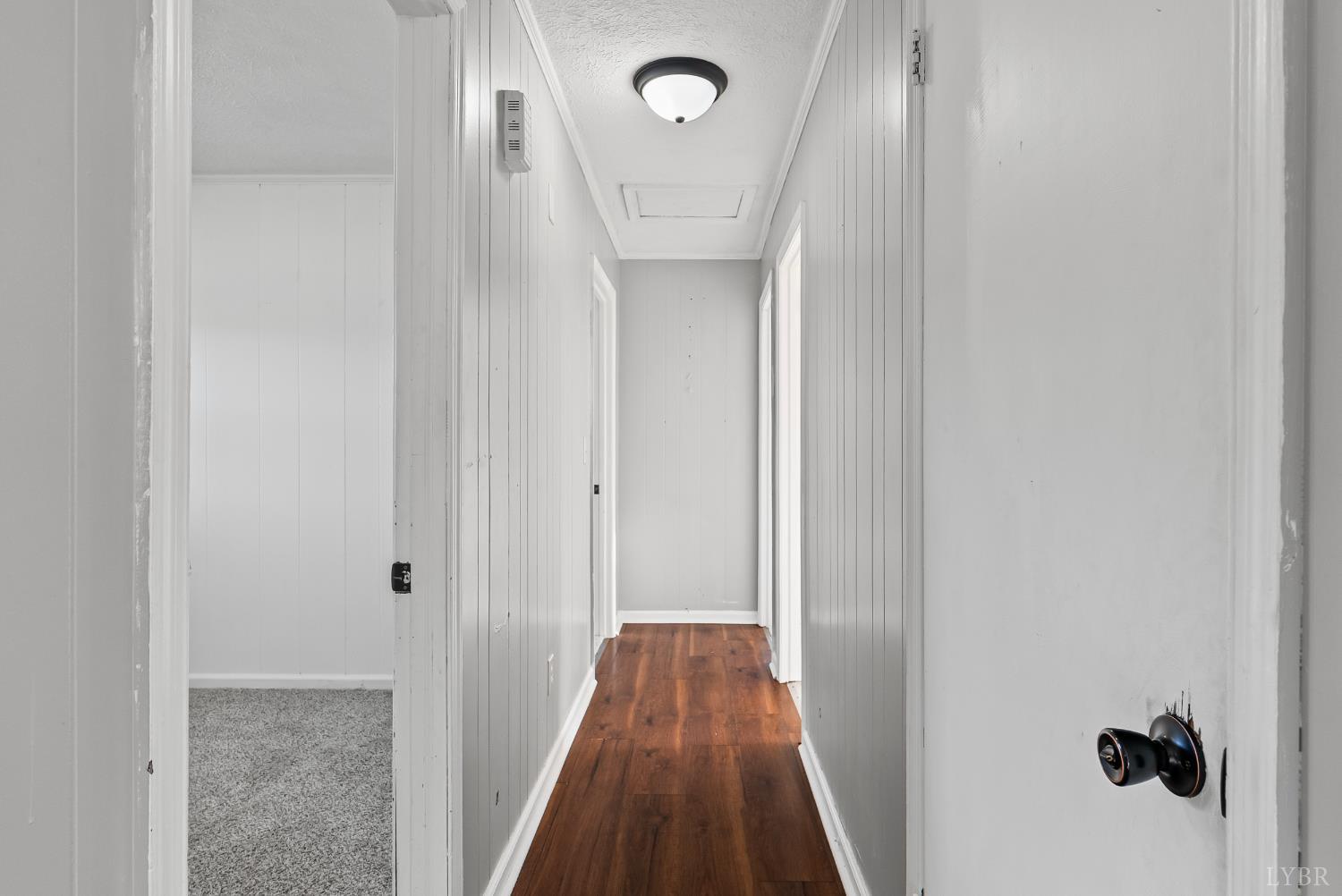 6068 Java Road Java, VA 24565 - Photo 12 of 43 a view of a hallway with wooden floor