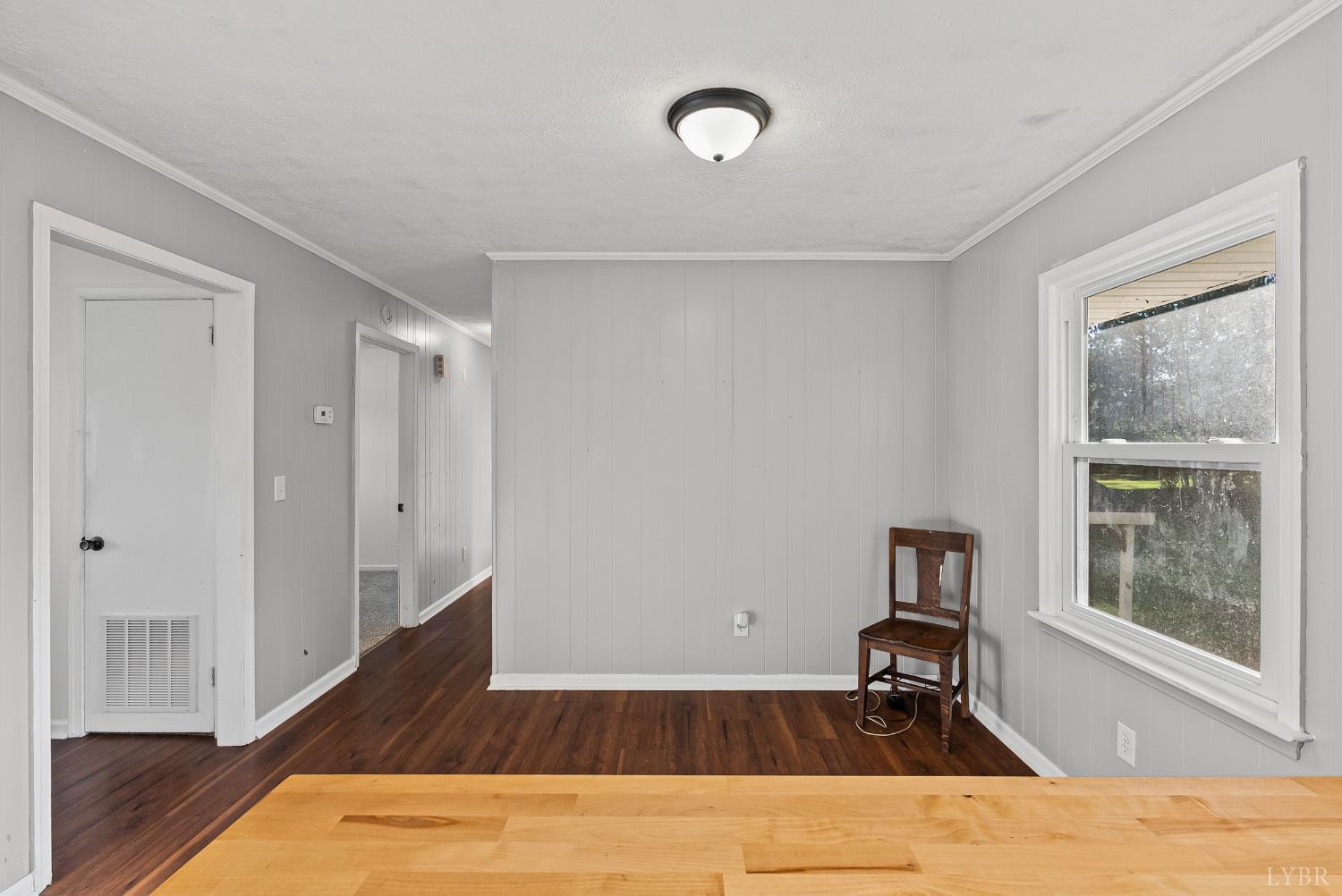 6068 Java Road Java, VA 24565 - Photo 8 of 43 a view of a room with wooden floor and a window