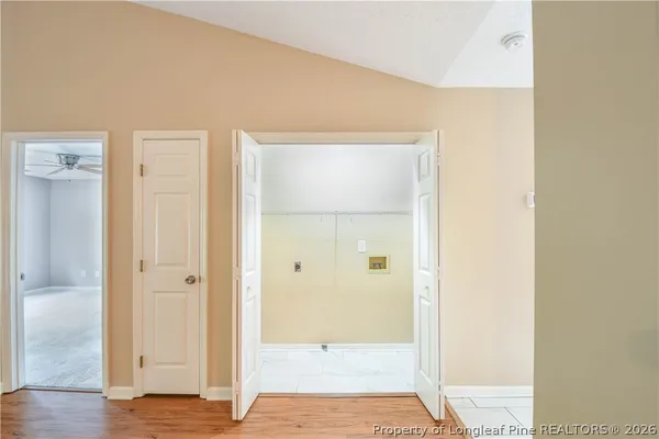 a view of entryway with wooden floor