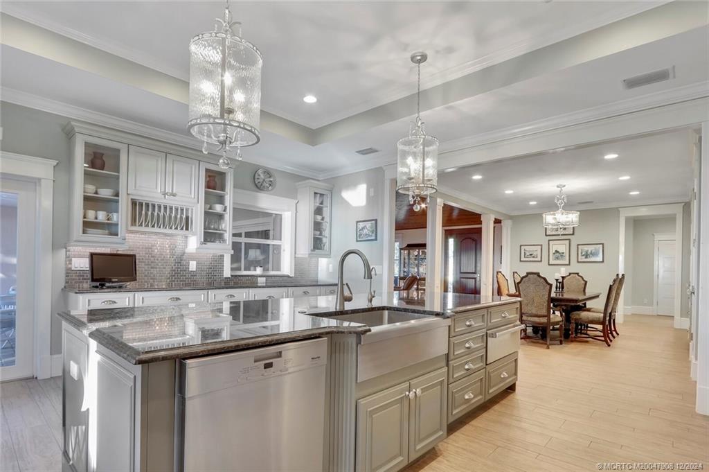 51 North River Road Stuart, FL 34996 - Photo 18 of 59 a large kitchen with a counter space
