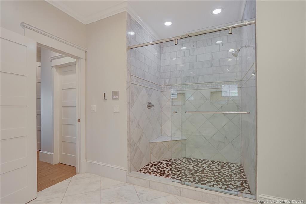 51 North River Road Stuart, FL 34996 - Photo 22 of 59 a bathroom with a shower
