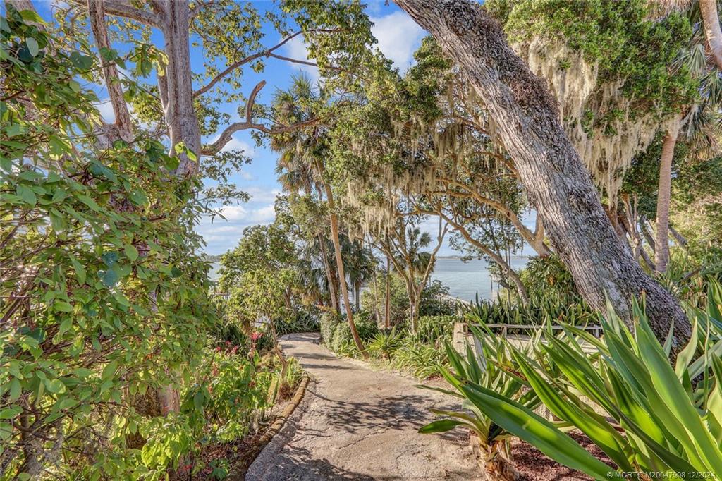 51 North River Road Stuart, FL 34996 - Photo 40 of 59 a pathway of a yard