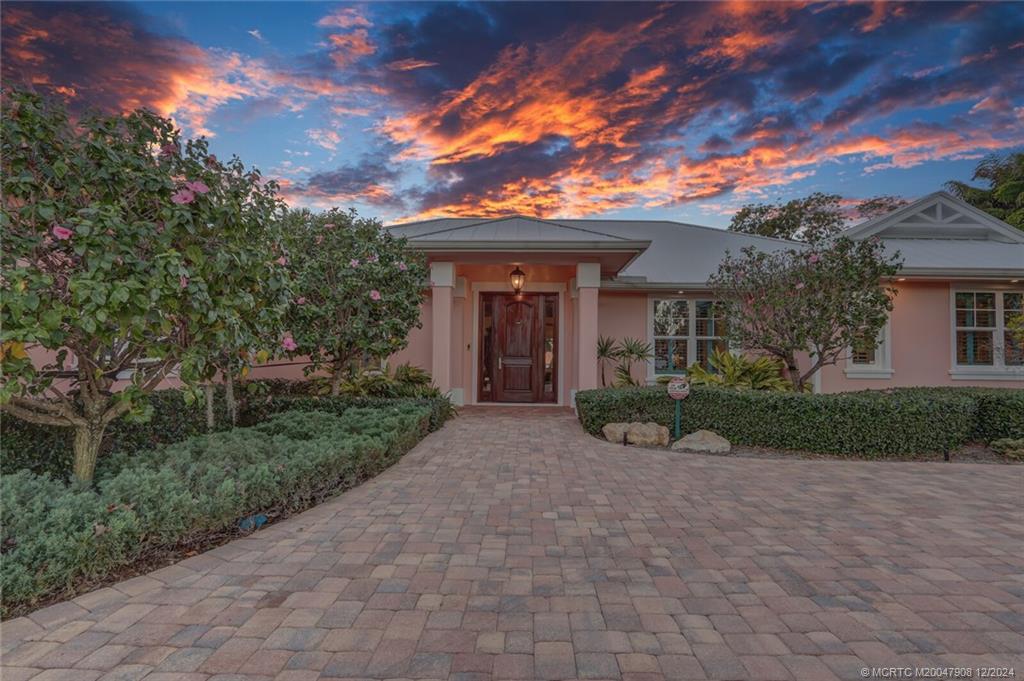 51 North River Road Stuart, FL 34996 - Photo 49 of 59 a view of a house with a porch