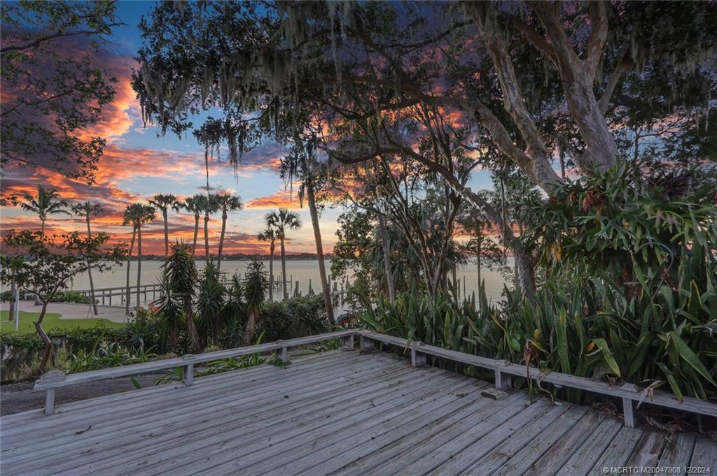 51 North River Road Stuart, FL 34996 - Photo 52 of 59 a view of outdoor space with deck and yard