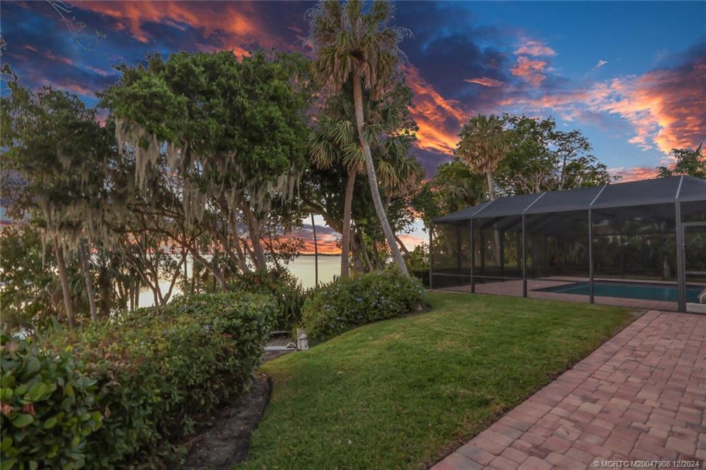 51 North River Road Stuart, FL 34996 - Photo 59 of 59 a view of a backyard with green space