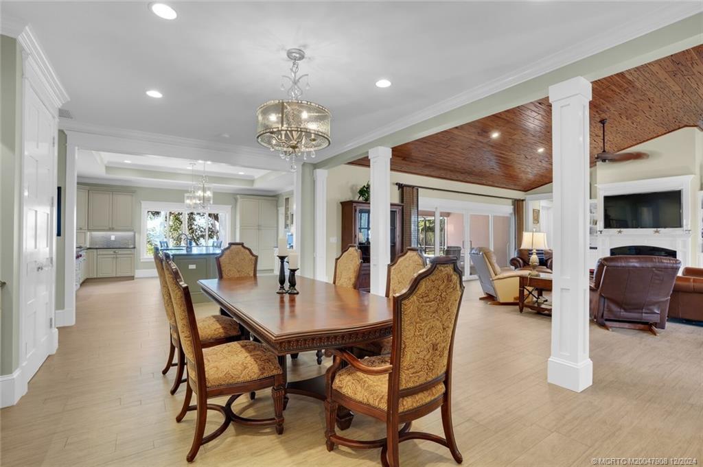 51 North River Road Stuart, FL 34996 - Photo 8 of 59 a view of a dining room with furniture