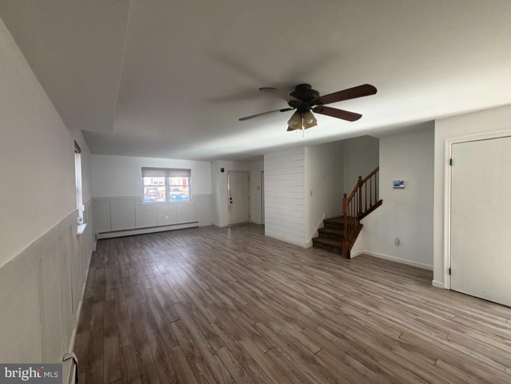 3106 Walnut Ridge Drive Pottstown, PA 19464 - Photo 12 of 14 a view of empty room with wooden floor and fan