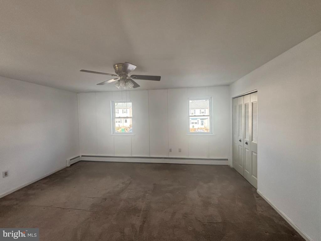 3106 Walnut Ridge Drive Pottstown, PA 19464 - Photo 10 of 14 wooden floor in an empty room with a window