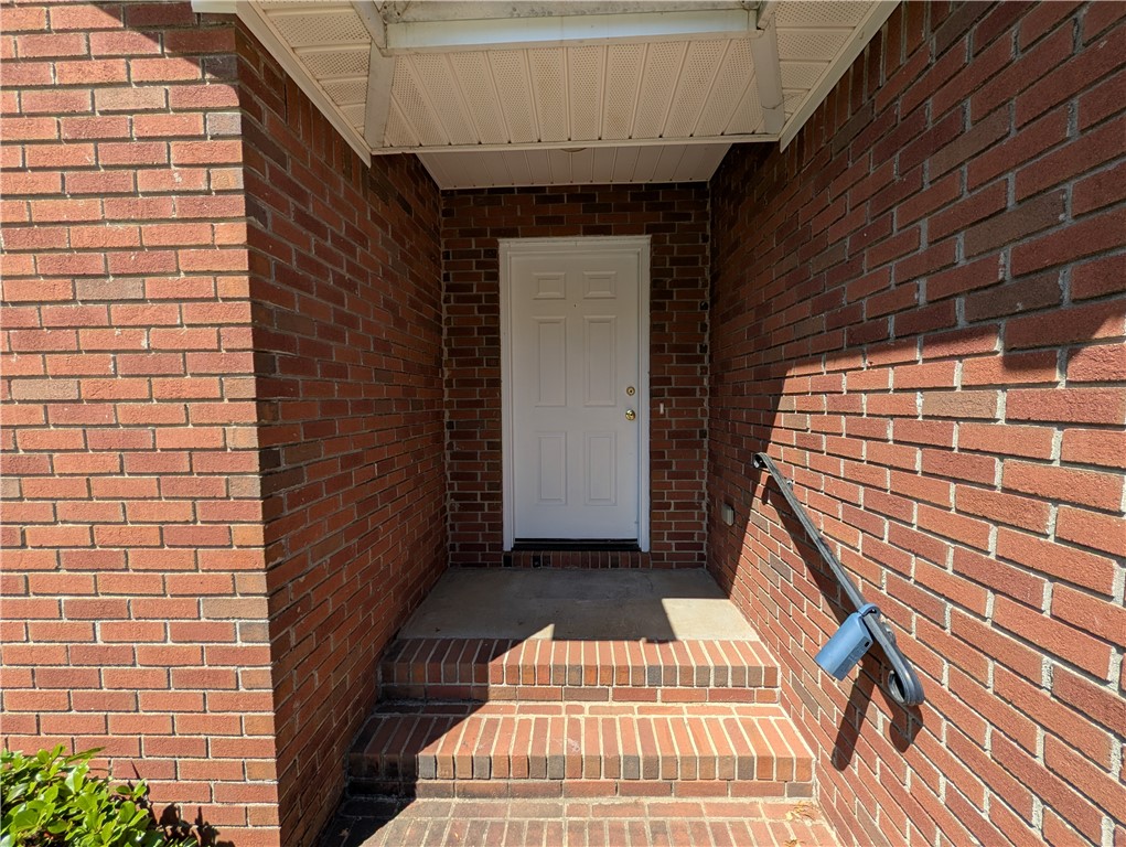 124 Woodbridge Court Anderson, SC 29621 - Photo 8 of 15 Welcome home to this charming brick exterior, offering a blend of traditional elegance and modern curb appeal.