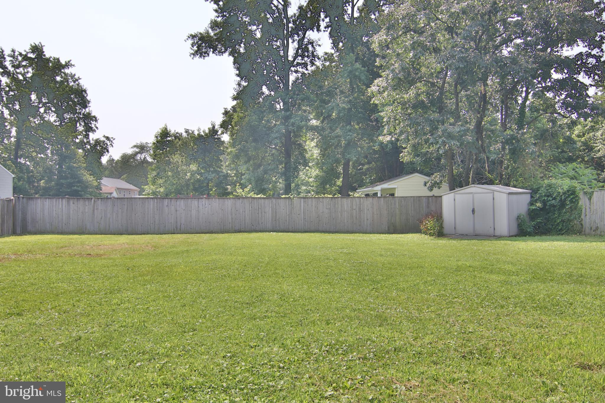 705 Powhatan Beach Road Pasadena, MD 21122 - Photo 22 of 22 Rear Fenced Yard and Storage Shed