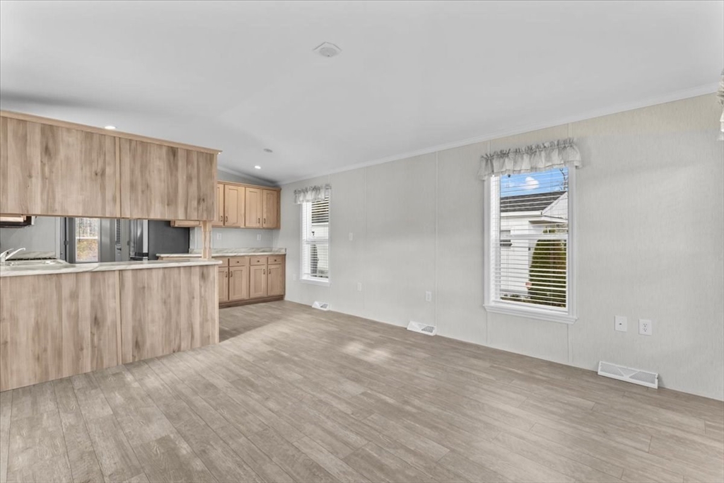 1540 Broadway, Unit 35 Raynham, MA 02767 - Photo 19 of 21 a view of kitchen with furniture and window