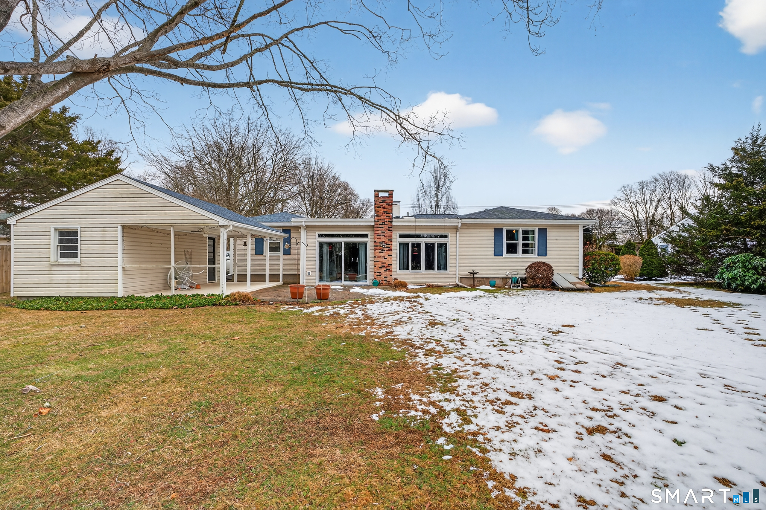 103 Maple Avenue Old Saybrook, CT 06475 - Photo 30 of 34 a view of a house with a backyard and a tree