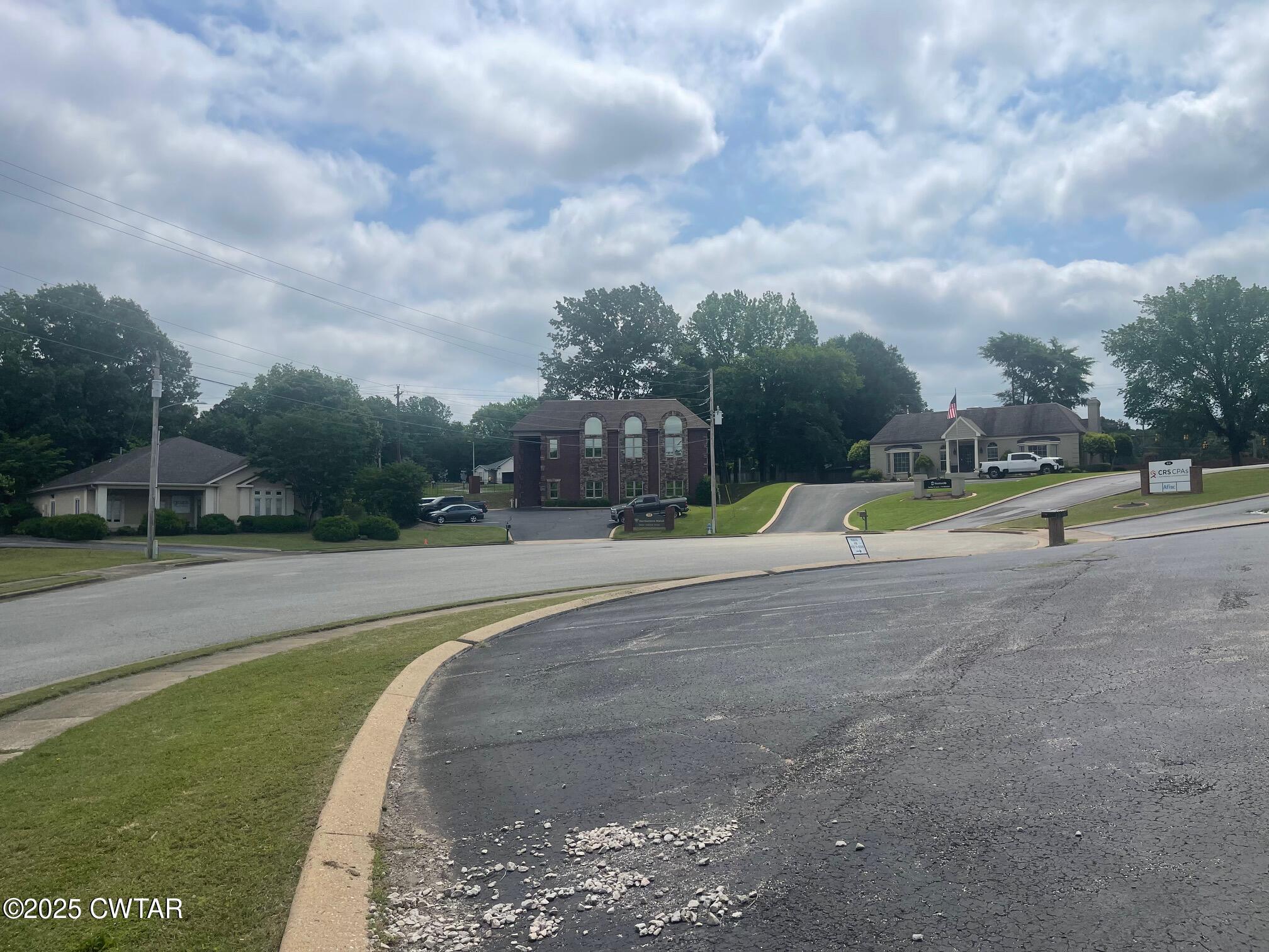 47 Lynoak Cove Jackson, TN 38305 - Photo 9 of 13 a view of a playground with basketball court