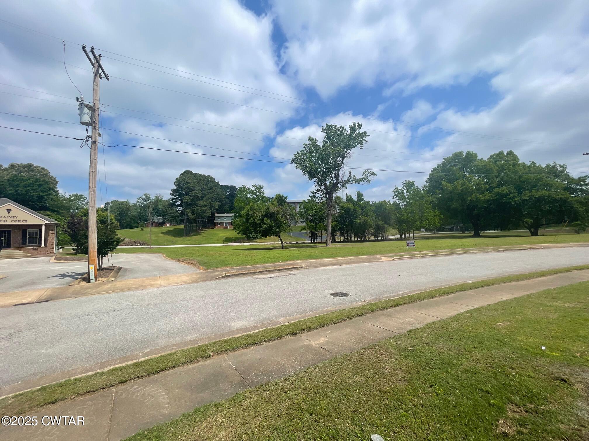 47 Lynoak Cove Jackson, TN 38305 - Photo 10 of 13 a view of a playground with basketball court