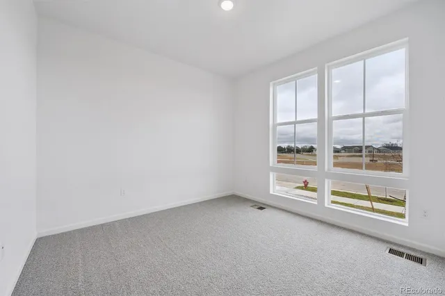 an empty room with window