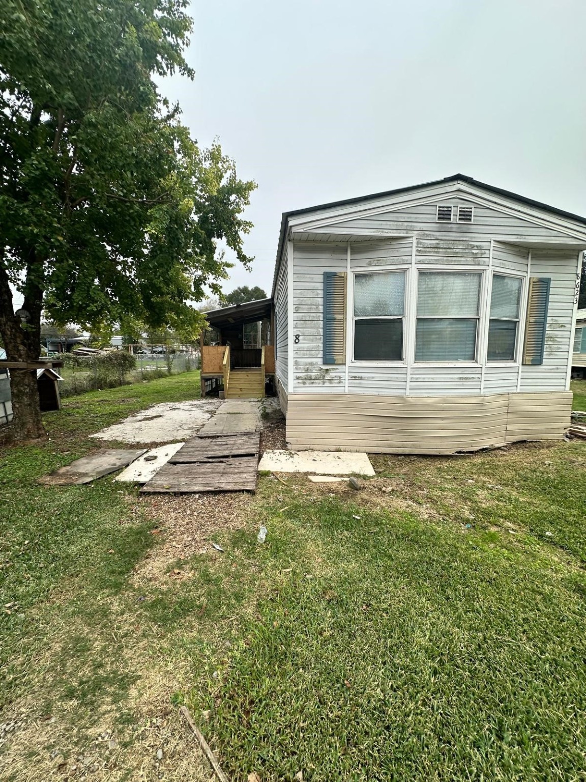 a house view with a garden space