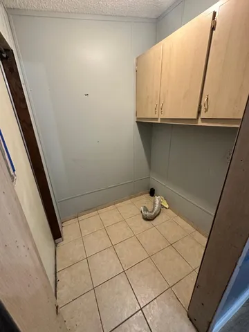 a bathroom with a sink and a window