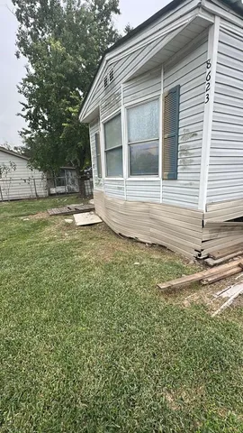 a house view with a outdoor space