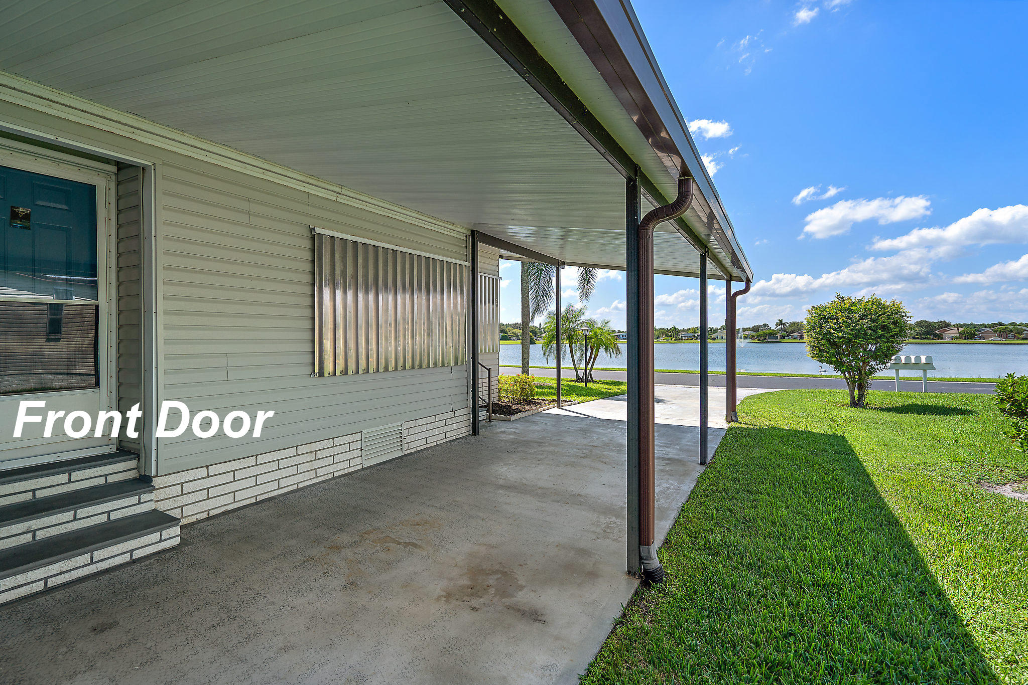 8933 Southwest Chevy Circle Stuart, FL 34997 - Photo 6 of 43 Carport view pic
