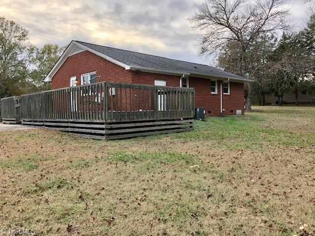 1602 Petty Road Graham, NC 27253 - Photo 2 of 15 Side view deck and spacious back and side yard