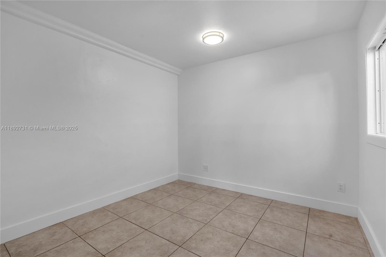 4111 Southwest 33rd Street, Unit B West Park, FL 33023 - Photo 4 of 8 wooden floor in a empty room