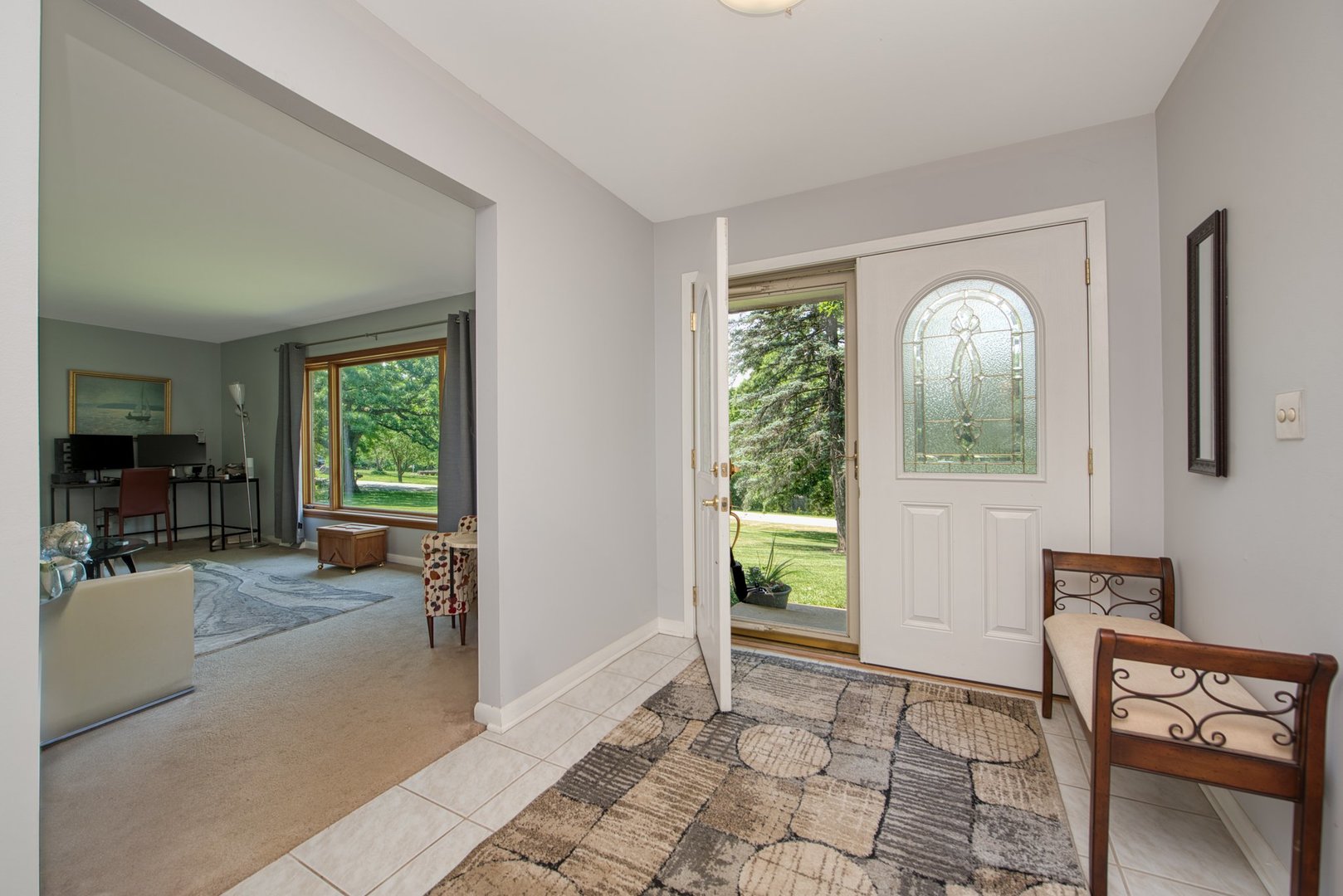 1196 Nottingham Lane Elgin, IL 60120 - Photo 9 of 45 a living room with furniture and a window