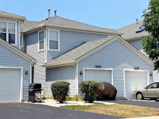 16652 South Windsor Lane Lockport, IL 60441 - Photo 1 of 15 a view of a house with a yard