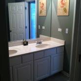 16652 South Windsor Lane Lockport, IL 60441 - Photo 15 of 15 a bathroom with a sink and a mirror