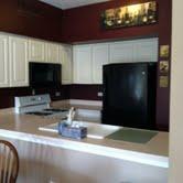 16652 South Windsor Lane Lockport, IL 60441 - Photo 9 of 15 a kitchen with a stove and a microwave