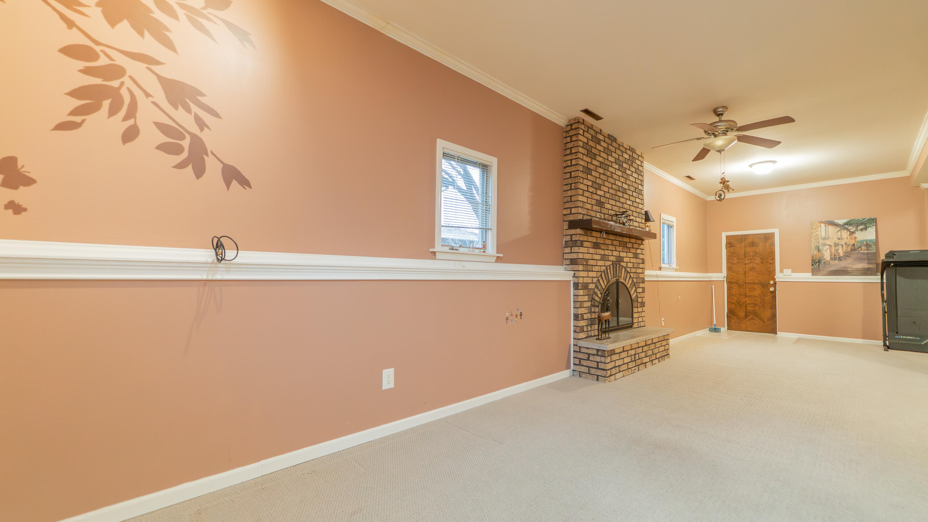 9439 Walnut Drive Munster, IN 46321 - Photo 14 of 40 a view of a big room with closet and windows