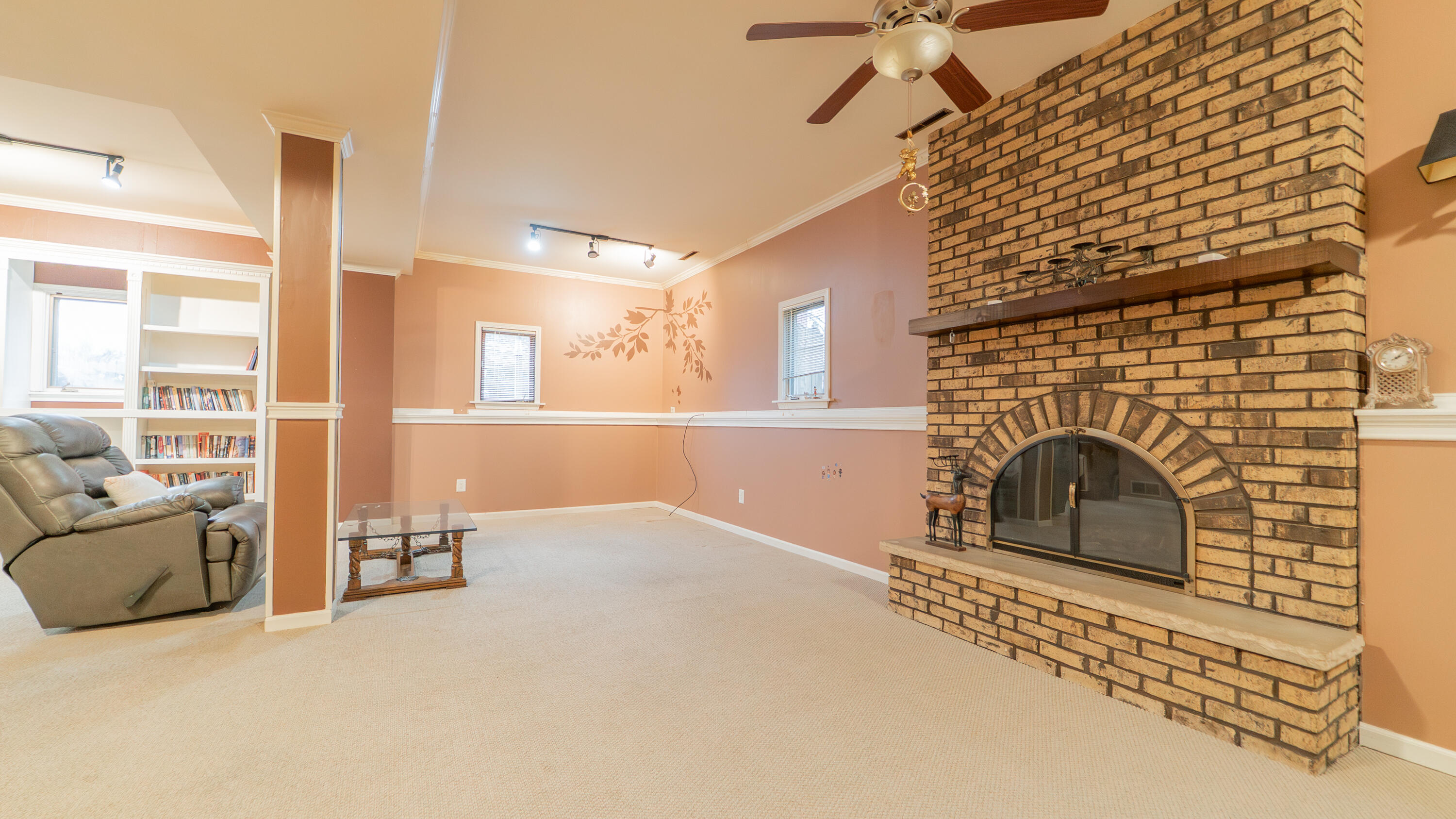 9439 Walnut Drive Munster, IN 46321 - Photo 15 of 40 a living room with furniture and a fireplace