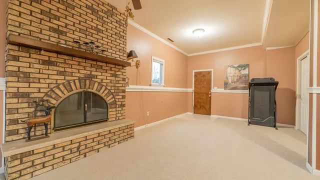 a view of a livingroom with a fireplace