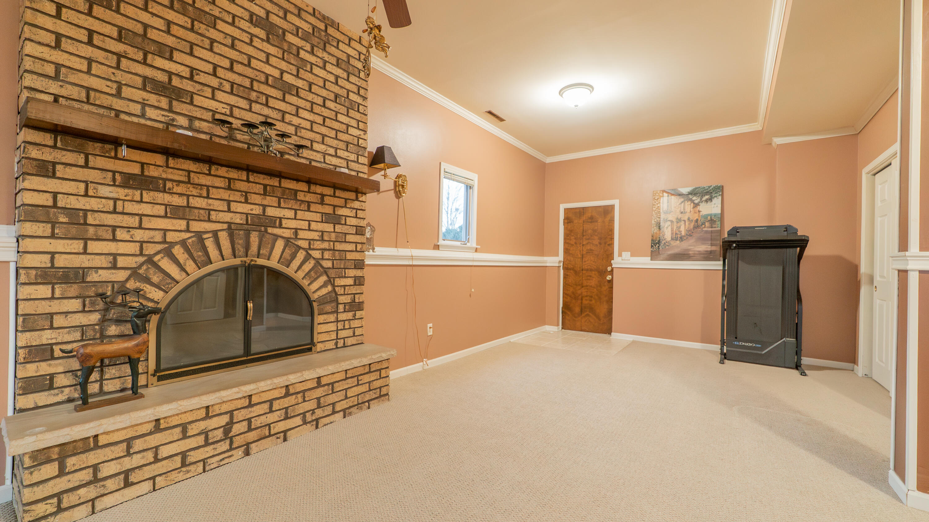 9439 Walnut Drive Munster, IN 46321 - Photo 16 of 40 a view of a livingroom with a fireplace