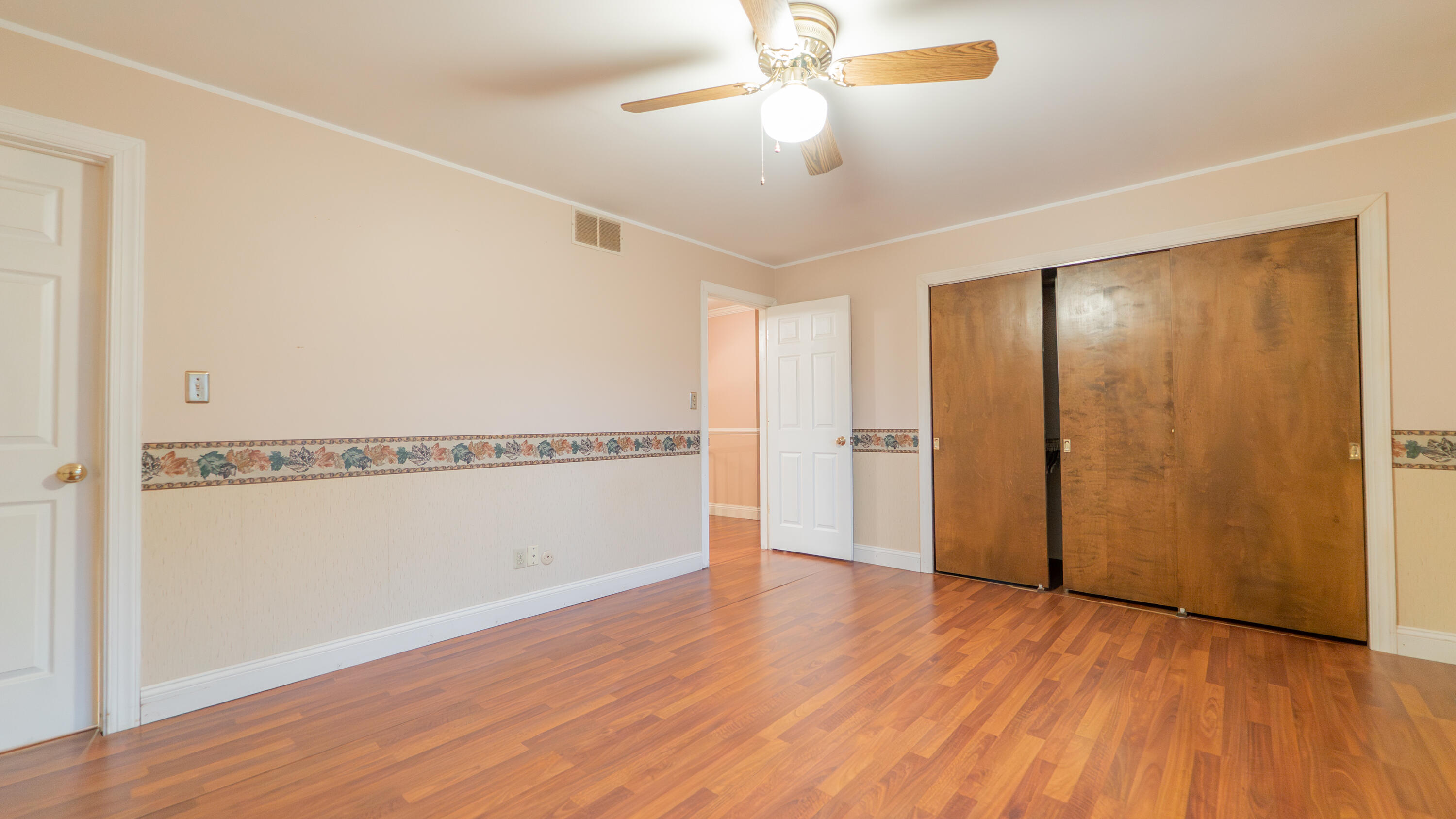 9439 Walnut Drive Munster, IN 46321 - Photo 23 of 40 a view of an empty room with wooden floor