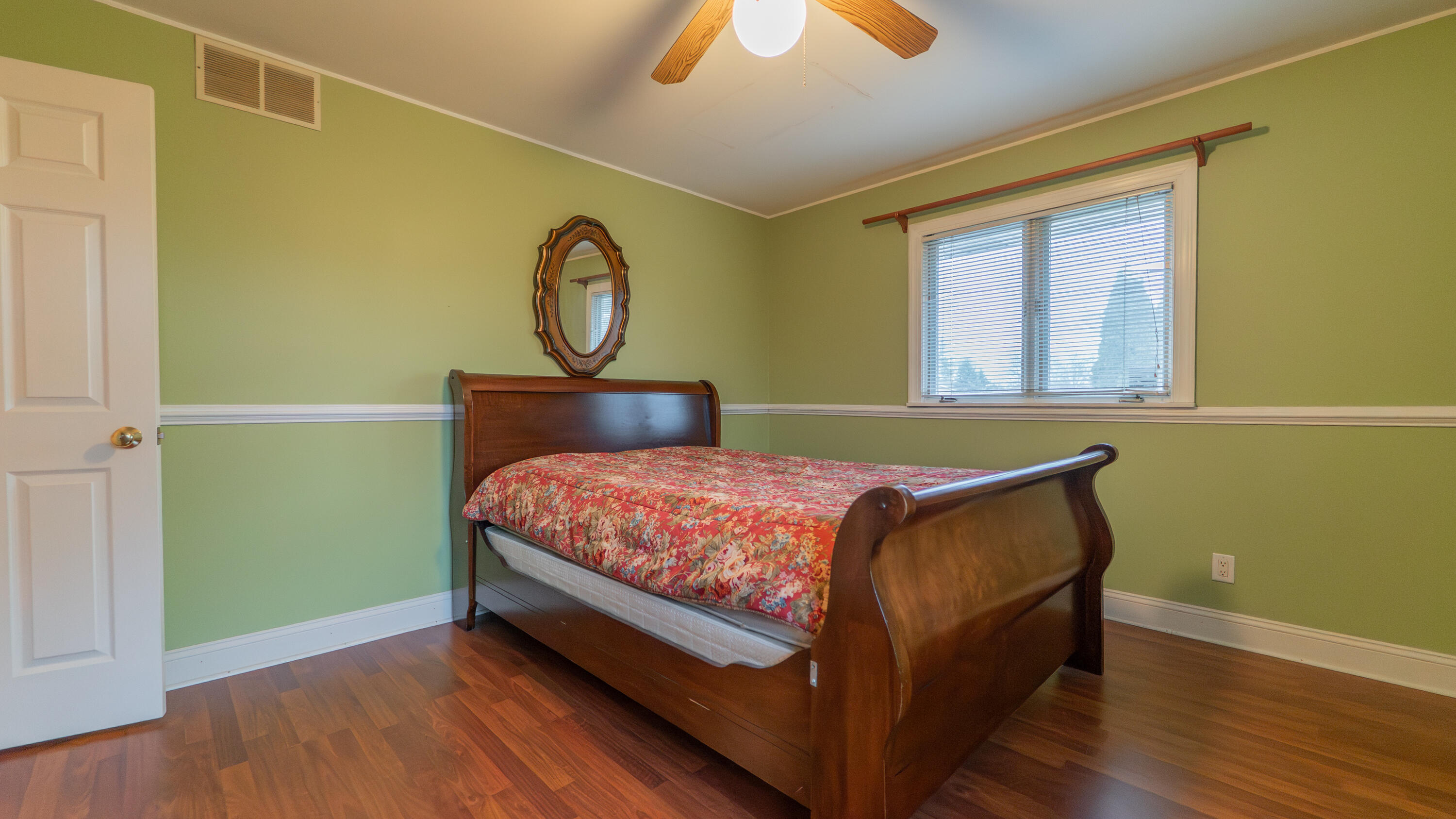 9439 Walnut Drive Munster, IN 46321 - Photo 26 of 40 a bedroom with a bed and window