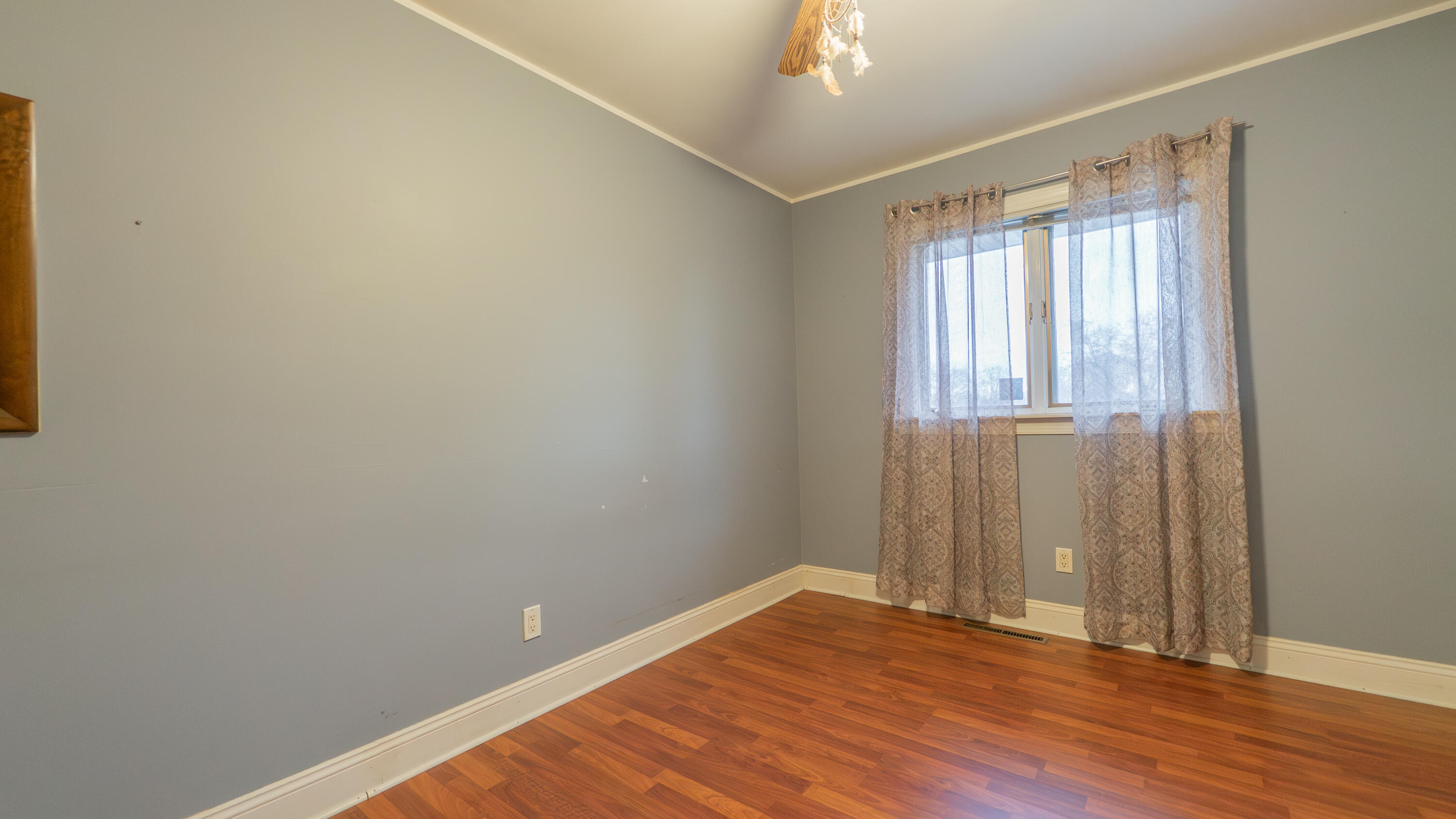 9439 Walnut Drive Munster, IN 46321 - Photo 28 of 40 wooden floor in an empty room with a window